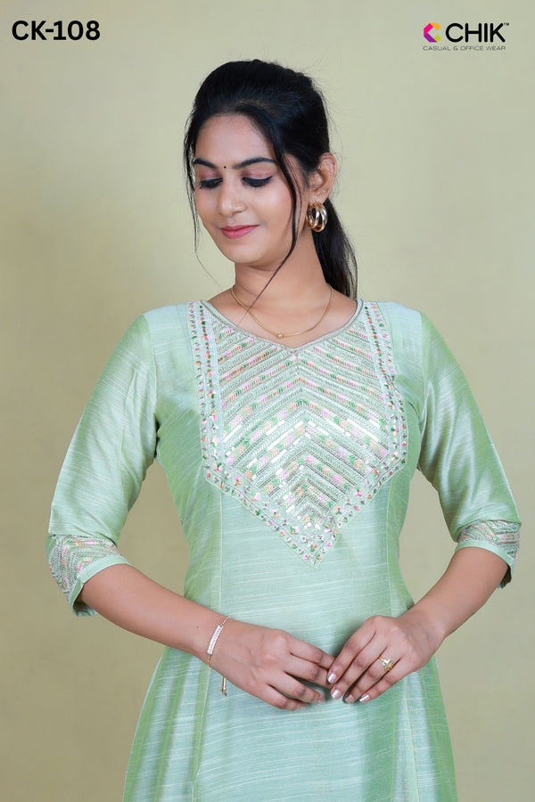 CK-108 LIGHT PISTA GREEN  COLOUR RAW SILK FABRIC ANARKALI FIT & YOKE EMBROIDERY WORK WITH SEQUENCE TOP LENGTH-46' SLEEVE-16'.