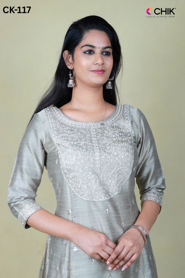 CK-117  GRAY COLOUR RAW SILK FABRIC ANARKALI FIT & FLORAL SEQUENCE EMBROIDERY WORK WITH GOLD ZARI TOP LENGTH-46' SLEEVE-16'.