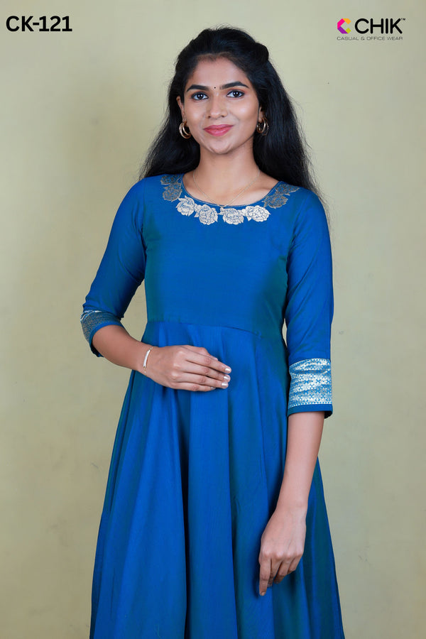 CK-121 RAMA BLUE COLOUR RAW SILK FABRIC FULL FLARE ANARKALI FIT & BORDER EMBROIDERY WORK WITH GOLD ZARI TOP LENGTH-52' SLEEVE -16'.