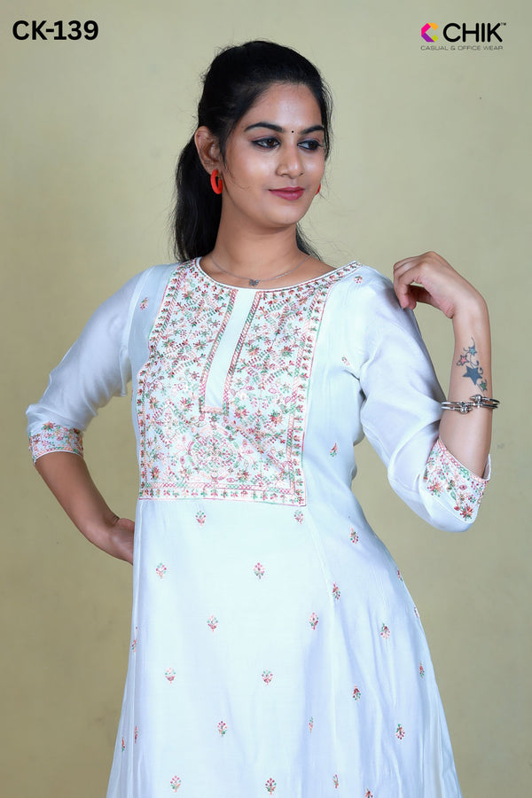 CK-139 WHITE COLOUR RAW SILK FABRIC ANARKALI FIT & YOKE EMBROIDERY WORK ALL OVER BUTTAS  WITH SEQUENCE TOP LENGTH-46' SLEEVE-16'.