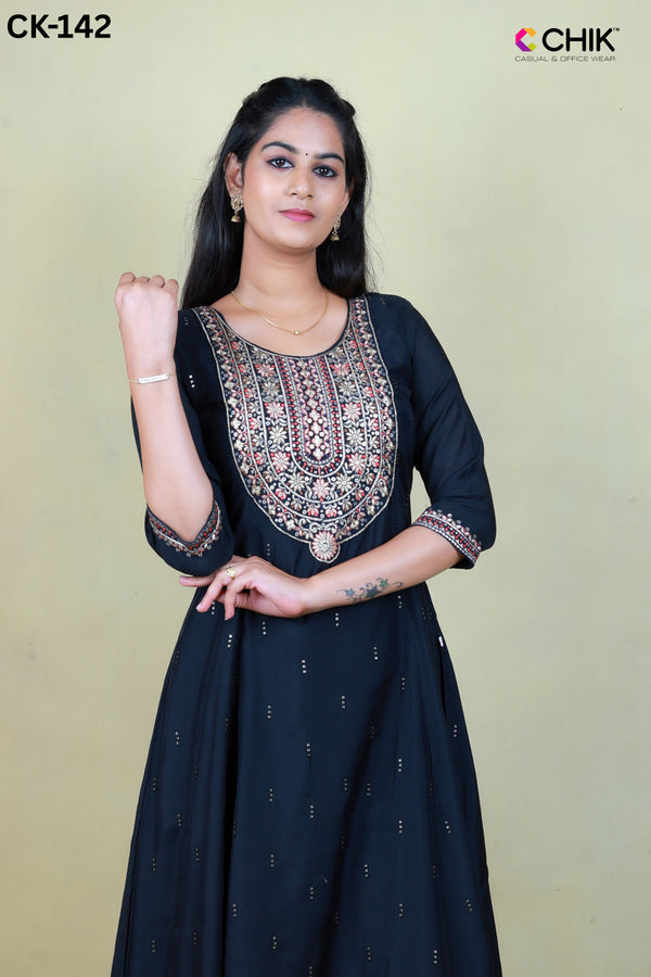 CK-142  BLACK  COLOUR RAW SILK FABRIC ANARKALI FIT & YOKE EMBROIDERY WORK & ALL OVER BUTTAS WITH SEQUENCE TOP LENGTH-46' SLEEVE-16'.