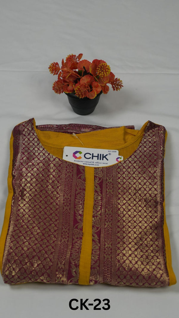 CK-23 Mustard Yellow Colour Raw Silk Fabric Full Flare Anarkali Fit & Zari Border Patch Work Top Length-52Inch,Sleeve Length-16 Inch