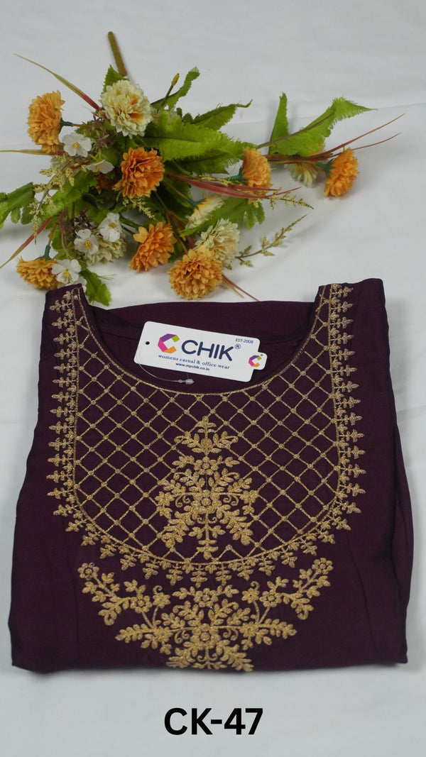 CK-47 Dark Purple Colour Vichitra Georgette Fabric Anarkali Fit & Classic Embroidery Work With Gold Zari Top Length-46 Inch Sleeve Length-16 Inch With Lining